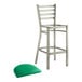 A Lancaster Table & Seating metal ladder back bar stool with a green vinyl padded seat.