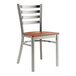 A Lancaster Table & Seating metal ladder back chair with a wood seat.