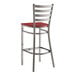A Lancaster Table & Seating bar stool with a mahogany seat.