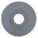 A grey circular rubber disc with text in the middle that reads "Metro"