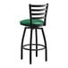 A Lancaster Table & Seating black ladder back swivel bar stool with green vinyl padded seat.