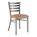 A Lancaster Table & Seating metal restaurant chair with a light brown vinyl seat and ladder back.