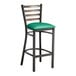 A Lancaster Table & Seating distressed copper metal ladder back bar stool with a green vinyl padded seat.