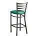 A Lancaster Table & Seating distressed copper ladder back bar stool with a green vinyl cushion.