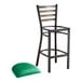 A Lancaster Table & Seating distressed copper metal bar stool with a green vinyl cushion on the seat.