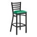 A Lancaster Table & Seating black ladder back bar stool with a green vinyl padded seat.