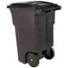 A brownstone Toter rectangular trash can with wheels.