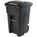 A black Toter rectangular trash can with wheels.