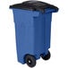 a blue trash can with black wheels
