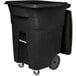 A black Toter rectangular trash can with wheels and a lid.