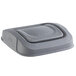 A Toter gray plastic lid with a curved top for a slim trash can.