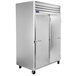 A large silver Traulsen G Series reach-in refrigerator with two doors.