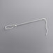 A long silver metal rod with a hook on the end.