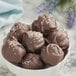 a bowl of chocolate truffles