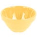 A close-up of a GET Tropical Yellow Melamine Bowl.