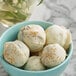 A bowl of Guittard white chocolate wafers.