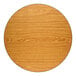 A round, 36-inch laminated table top with a reversible walnut and oak finish.