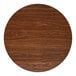 A 36-inch round laminated table top with a reversible walnut and oak finish.