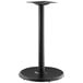 A black metal Lancaster Table & Seating Excalibur outdoor table base with a black pole.