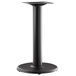 A Lancaster Table & Seating Excalibur black metal table base with a cylindrical pedestal.