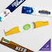 An Avantco customizable sign panel with white background and colorful drink labels.