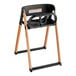 A Koala Kare black and natural wood high chair with a seat.