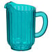 A turquoise plastic pitcher with a handle.