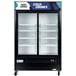 A white Avantco sign panel for a black refrigerator with glass doors.
