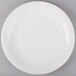 a white plate on a gray background