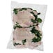 Two chicken breasts vacuum sealed in a Hamilton Beach vacuum seal pouch.