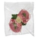 A piece of meat with garlic and herbs in a Hamilton Beach vacuum seal pouch.