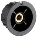 A black plastic circular knob with a gold center.