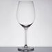 A clear Libbey wine glass on a white background.