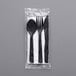 a black spoons in a plastic bag