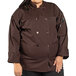 a woman wearing a brown chef coat