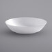 a white bowl on a gray background