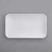 A white rectangular American Metalcraft melamine platter on a gray surface.