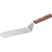 a metal spatula with a wooden handle