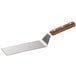 A Dexter-Russell metal hamburger turner with a rosewood handle.