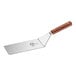 A Mercer Culinary Praxis heavy-duty turner with a rosewood handle.