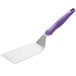 A Vollrath Jacob's Pride hamburger turner with a purple handle.