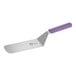 A Mercer Culinary Millennia® turner with a purple handle.