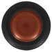 A close up of a RAK Porcelain Trinidad deep walnut and black plate with a spiral design on the rim.