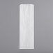 A white Bagcraft Packaging bread bag on a white surface.