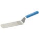 A Dexter-Russell metal turner with a blue plastic handle.