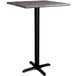 A Lancaster Table & Seating square bar height table with a black base and gray top.