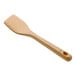 An OXO wooden spatula with a handle.