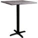 A Lancaster Table & Seating square counter height table with a black base and smooth finish.