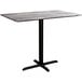 A rectangular gray Lancaster Table with a black cross base.