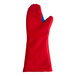 A red Tucker Safety oven mitt with blue lining.